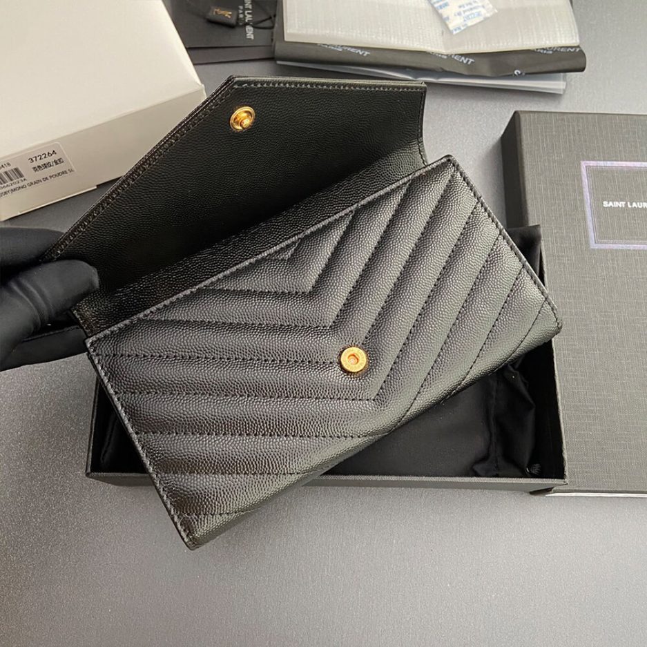 Y51 CASSANDRE MATELASSÉ LARGE FLAP WALLET IN GRAIN DE POUDRE LEATHER